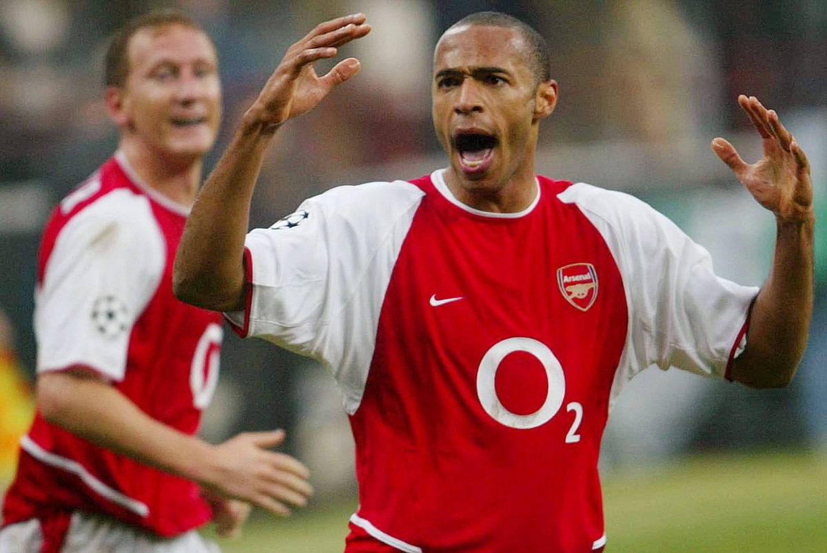 Arsenal's Thierry Henry jubilates at the end of his Champions League match against Inter Milan, in Milan 25 November 2003. Arsenal won 5-1. EPA/DANIEL DAL ZENNARO