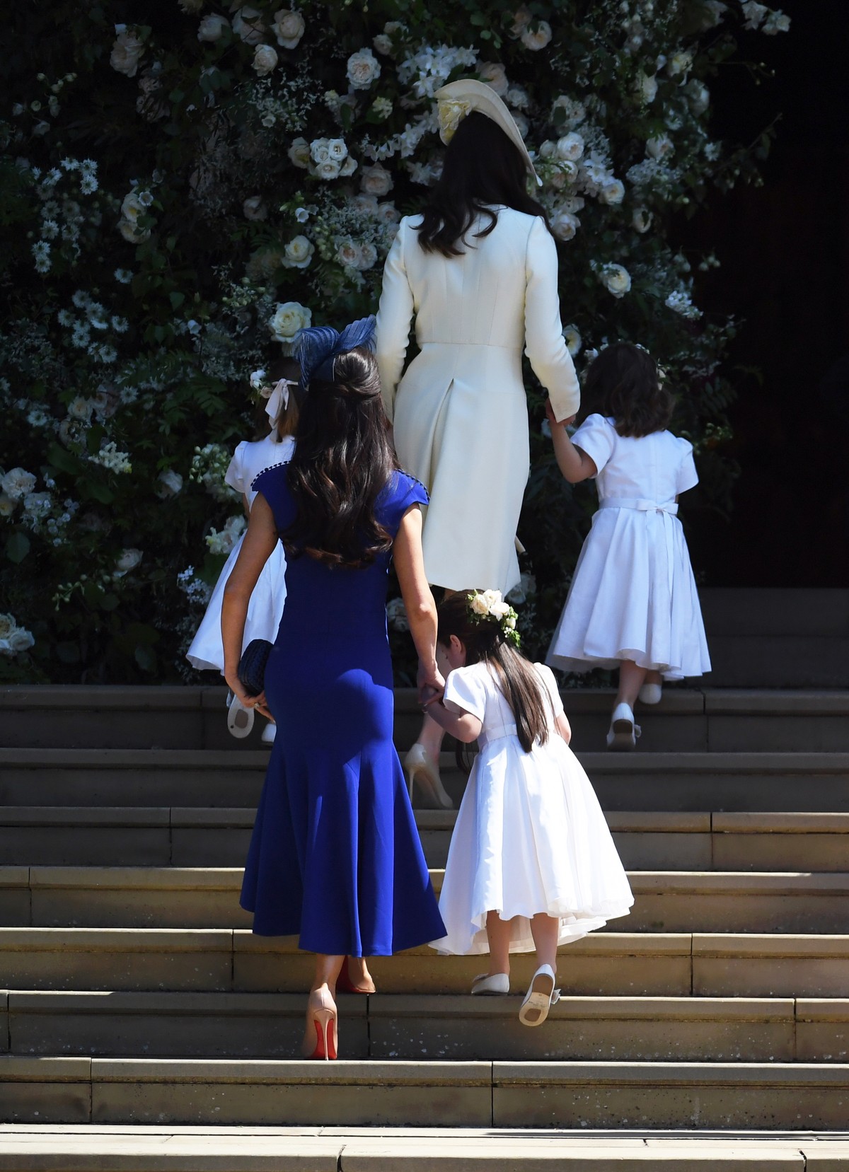 epa06749136 Britain's Catherine (Top L) the Duchess of Cambridge arrives with bridesmaids and pageboys for the royal wedding ceremony of Britain's Prince Harry and Meghan Markle at St George ...