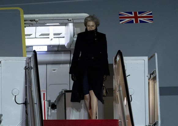 British Prime Minister Theresa May steps off from her plane upon her arrival at Andrews Air Force Base, Md., Thursday, Jan. 26, 2017. May will meet President Donald Trump on Friday. ( AP Photo/Jose Lu ...