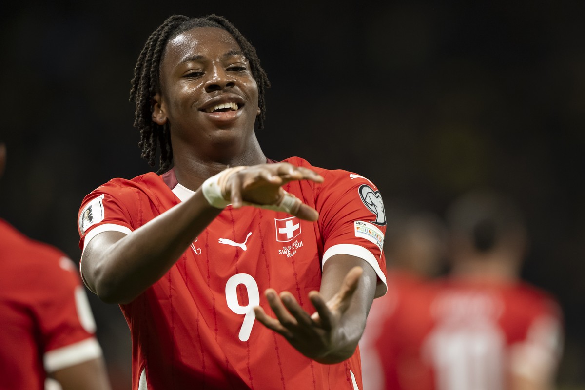 Switzerland's Johan Manzambi celebrates after scoring his side's second goal during the FIFA World Cup 26 UEFA Qualifiers Group B match between Sweden and Switzerland, at Strawberry Arena, i ...