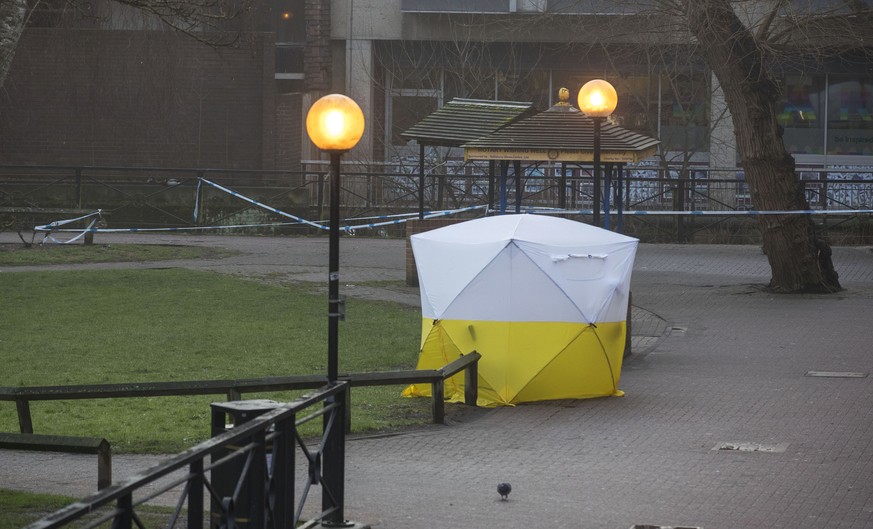 A police tent covers the the spot where former Russian double agent Sergei Skripal and his companion were found critically ill Sunday following exposure to an &quot;unknown substance&quot; in Salisbur ...
