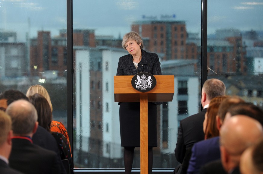 epa07345655 British Prime Minister Theresa May delivers a speech on Brexit in Belfast, Northern Ireland, 05 February 2019. May is expected to outline her plans to avoid a hard border with Ireland in h ...