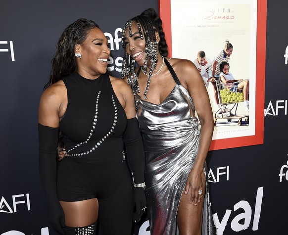 Executive producers Serena Williams, left, and Venus Williams arrive at the premiere of &quot;King Richard&quot; during the American Film Fest at the TCL Chinese Theatre on Sunday, Nov. 14, 2021, in L ...