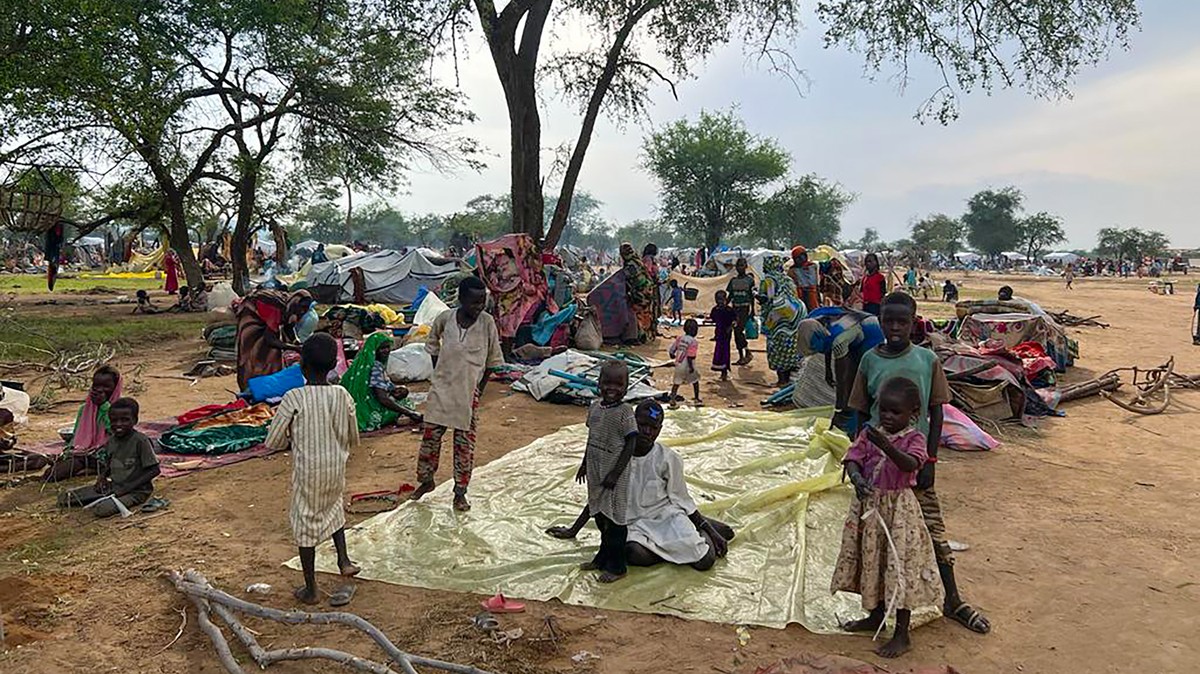 Sudanese refugees who fled the conflict in Sudan gather Monday July 10, 2023 at the Zabout refugee Camp in Goz Beida, Chad. The U.N. says the conflict in Sudan has driven more than 3.1 million people  ...
