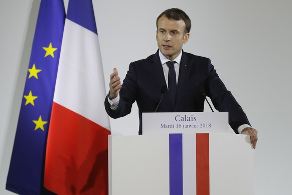 epa06443259 French President Emmanuel Macron delivers a speech to police officers and gendarmes in the Gendarmerie headquarters in Calais, northern France, 16 January 2018. Macron is on a day-trip to  ...