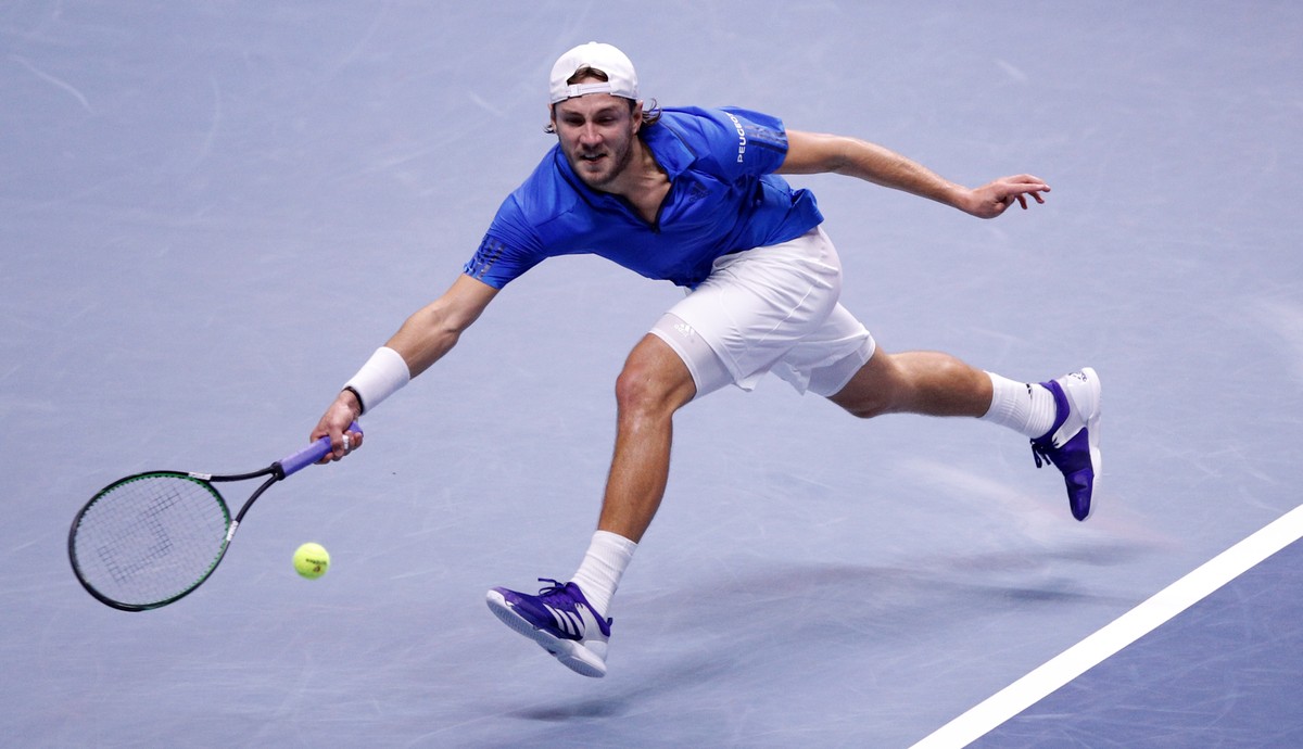 France's Lucas Pouille returns the ball to Belgium's Steve Darcis during their Davis Cup final single match at the Pierre Mauroy stadium in Lille, northern France, Sunday, Nov.26, 2017. (AP  ...