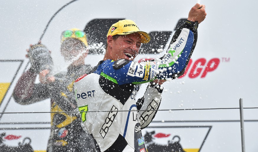 13.07.2014; Hohenstein-Ernstthal; Motorsport - GP Deutschland 2014; Jubel des Siegers Dominique Aegerter (SUI) auf dem Podium (Lukasz Swiderek/PSP/freshfocus)