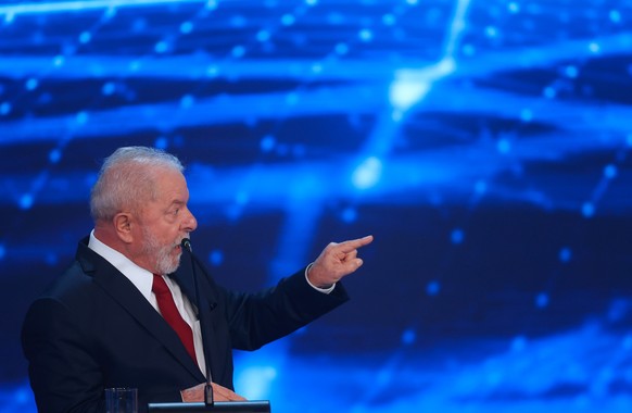 epa10144613 Former President of Brazil Luiz Inacio Lula da Silva participates in a debate at the television headquarters of Bandeirantes in Sao Paulo, Brazil, 28 August 2022. The Brazilian president,  ...