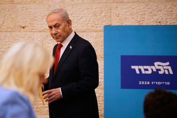 Israeli Prime Minister Benjamin Netanyahu, casts his ballot in his Likud party primary elections ahead of Israel's general election in October, in Jerusalem, Monday, Aug. 17, 2026. (AP Photo/Ohad ...
