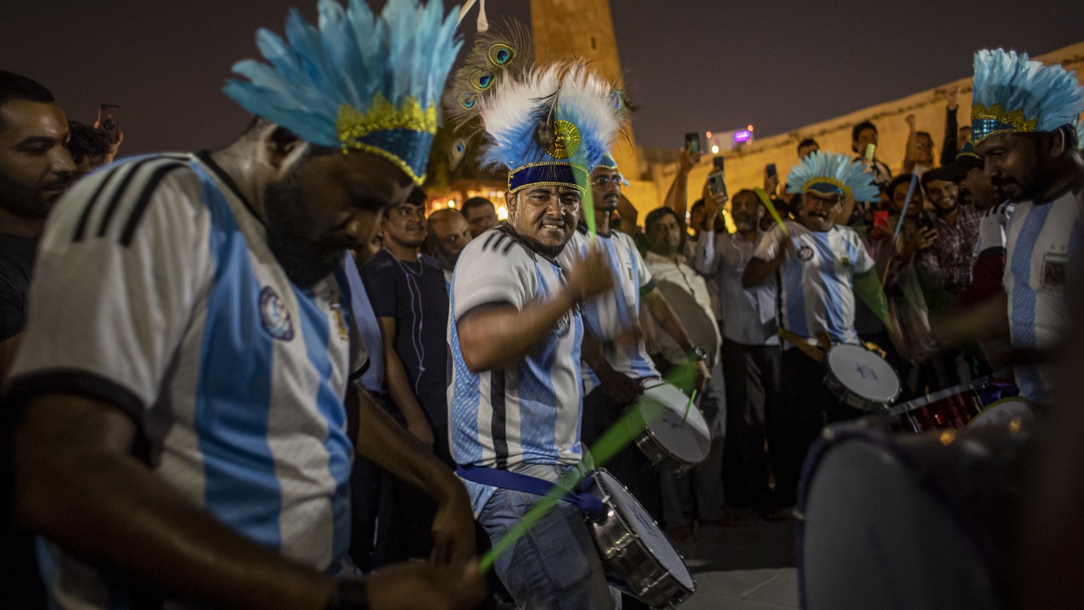 epa10306057 Argentinian fans drum roll at the Souq Waqif market area in Doha, Qatar, late 14 November 2022. The FIFA World Cup Qatar 2022 will take place from 20 November to 18 December 2022 in Qatar. ...