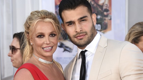 FILE - Britney Spears and Sam Asghari appear at the Los Angeles premiere of &quot;Once Upon a Time in Hollywood&quot; on July 22, 2019. Spears has married her longtime partner Sam Asghari at a Souther ...