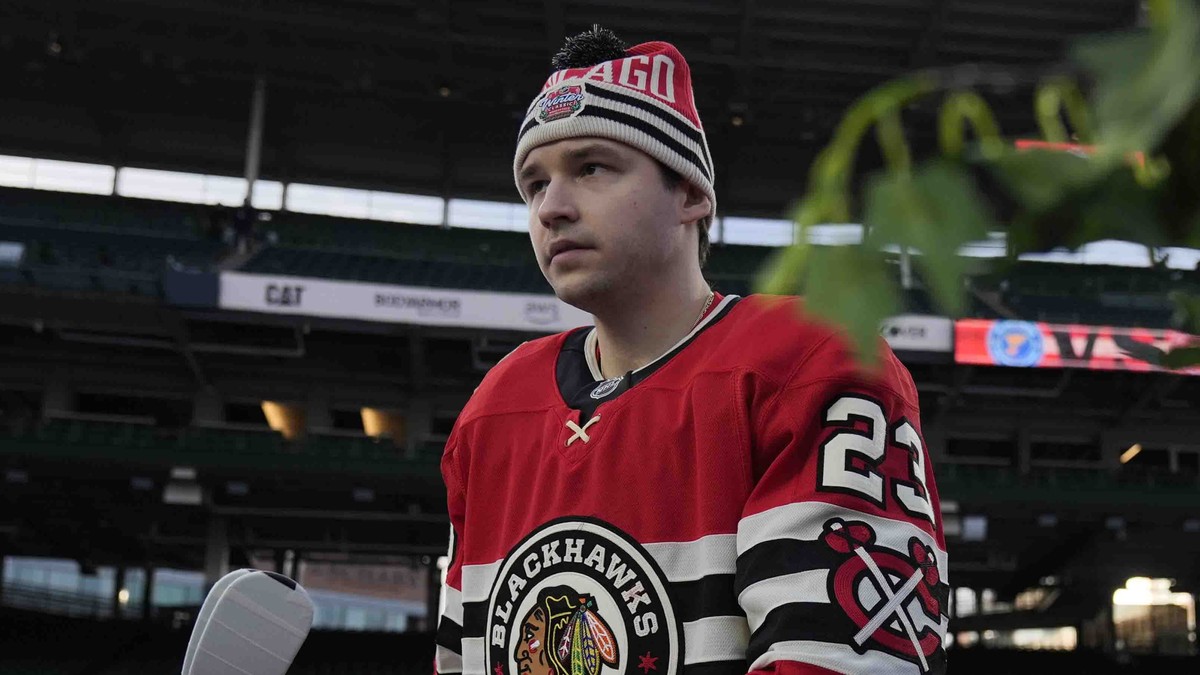 Chicago Blackhawks center Philipp Kurashev (23) takes the ice for practice on the day before the NHL Winter Classic outdoor hockey game featuring the Blackhawks and the St. Louis Blues at Wrigley Fiel ...