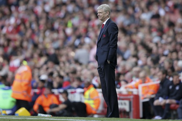 Arsenal manager Arsene Wenger looks dejected during the English Premier League soccer match between Arsenal and Everton at The Emirates stadium in London, Sunday May 21, 2017. (AP Photo/Tim Ireland)