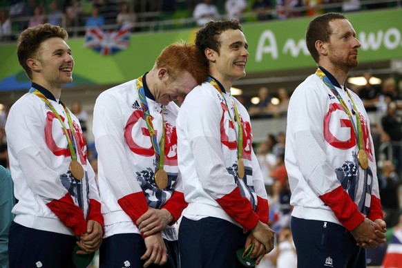 2016 Rio Olympics - Cycling Track - Victory Ceremony - Men&#039;s Team Pursuit Victory Ceremony - Rio Olympic Velodrome - Rio de Janeiro, Brazil - 12/08/2016. Owain Doull (GBR) of Britain, Ed Clancy ( ...