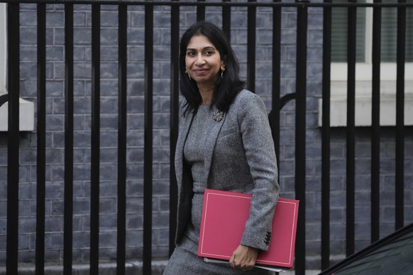 FILE - Suella Braverman, Britain&#039;s Home Secretary arrives for a cabinet meeting at 10 Downing Street in London, Oct. 18, 2022. British Home Secretary Suella Braverman left her job on Wednesday Oc ...