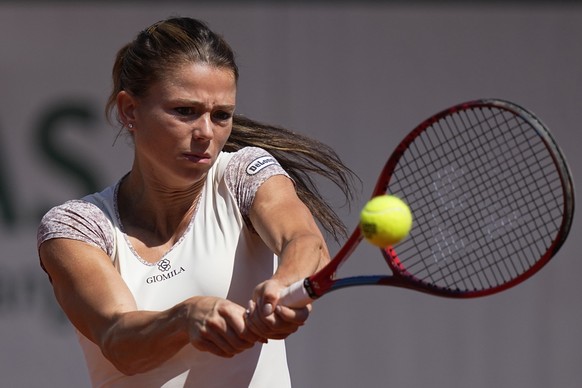 Italy&#039;s Camilla Giorgi returns the ball to Russia&#039;s Daria Kasatkina during their fourth round match of the French Open tennis tournament at the Roland Garros stadium Monday, May 30, 2022 in  ...