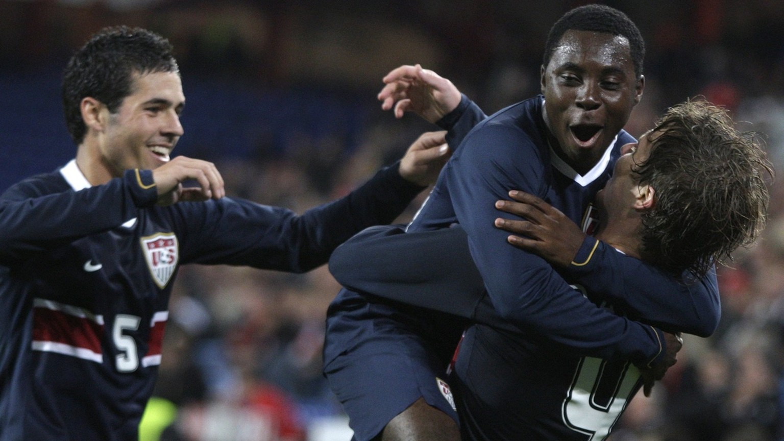 From left: US&#039;s players Benny Feilhaber, Freddy Adu and Michael Bradley celebrate their side&#039;s first goal during an Euro 2008 test game between the national soccer teams of Switzerland and t ...