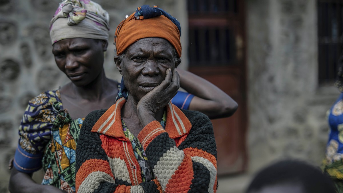 Women fleeing the fighting between M23 forces and the Congolese army find refuge in a church in Kibumba, north of Goma, Democratic Republic of Congo, Friday Jan. 28, 2022. In the past week, inhabitant ...