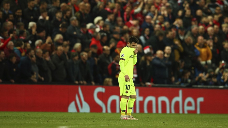 Barcelona&#039;s Lionel Messi leaves the playing field after losing the Champions League semifinal, second leg, soccer match against Liverpool at the Anfield stadium in Liverpool, England, Tuesday, Ma ...