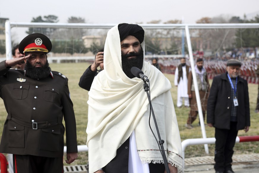 Taliban acting Interior Minister Sirajuddin Haqqani speaks during a graduation ceremony at the police academy in Kabul, Afghanistan, Saturday, March 5, 2022. Taliban acting Interior Minister Sirajuddi ...