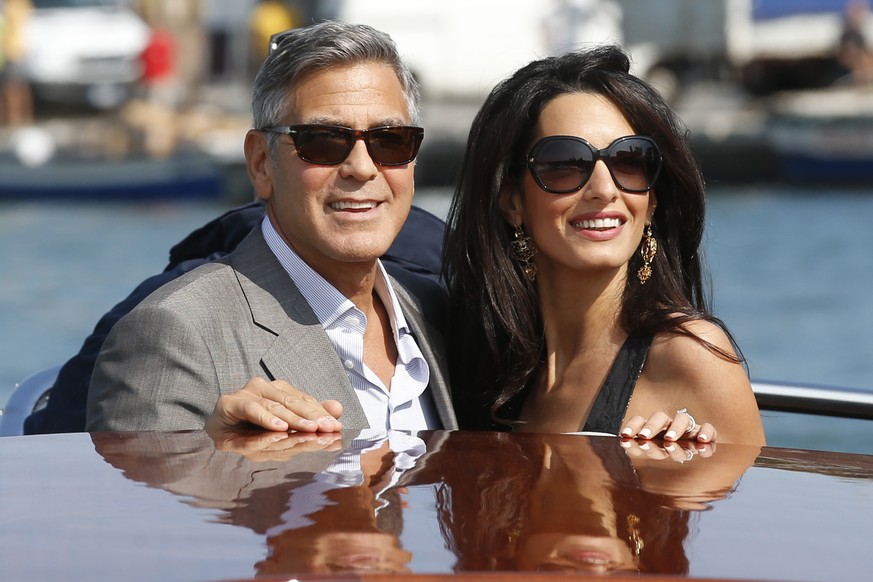 George Clooney und seine Verlobte Amal Alamuddin bei ihrer Ankunft am Freitag in Venedig.