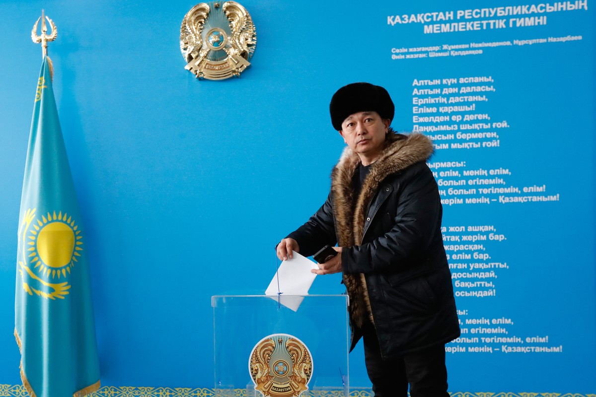 A man poses for a photo as he casts his ballot at a polling station during a referendum on a new constitution, in Astana, Kazakhstan, Sunday, on Sunday, March 15, 2026. (AP Photo)
Kazakhstan Referendu ...
