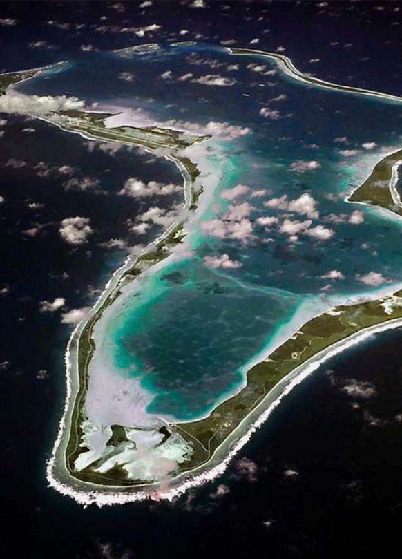 FILE - This image released by the U.S. Navy shows an aerial view of Diego Garcia in the Chagos Island group. (U.S. Navy via AP, File)
Britain Chagos