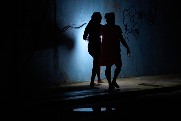 People walk in the night during a blackout in Havana, Cuba, Friday, July 10, 2026. (AP Photo/Ramon Espinosa)
Cuba Blackout