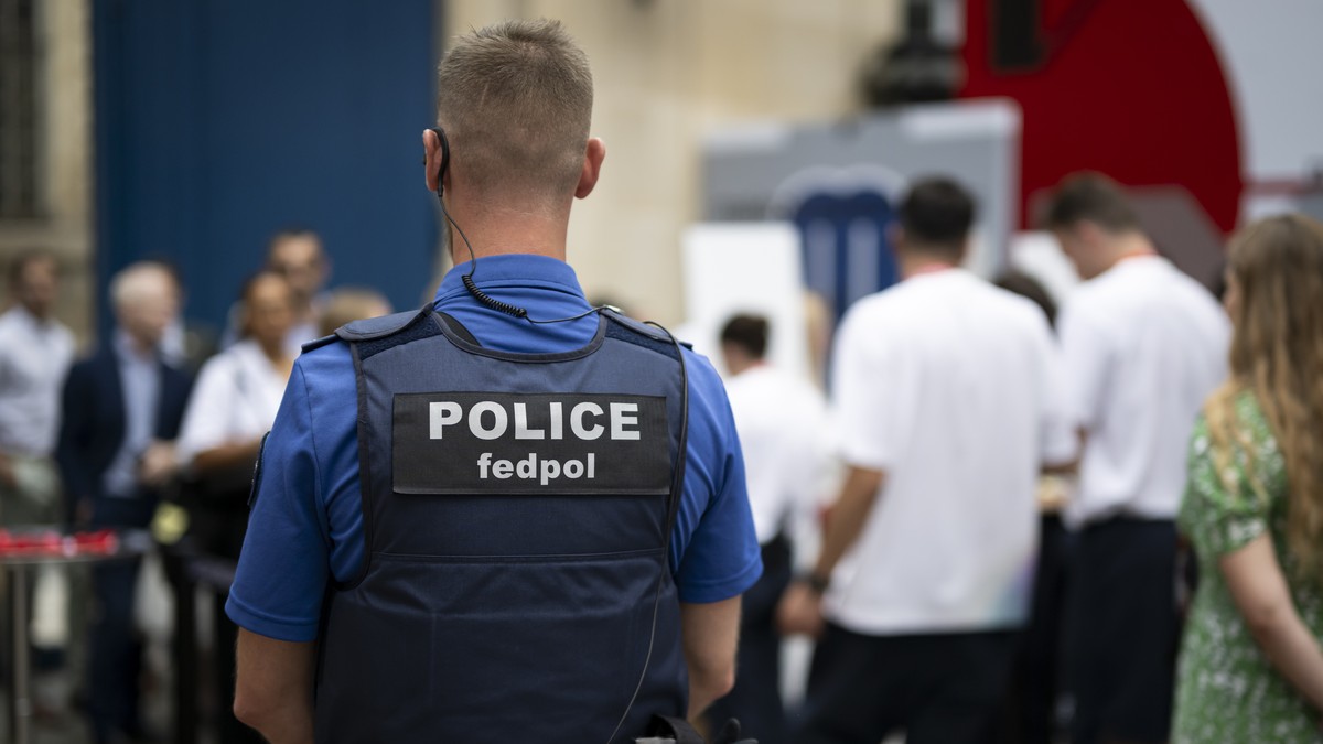 A policeman of the Federal Police Fedpol supervises the entrance of guests prior to the opening ceremony of the Maison Suisse in the Swiss Embassy in Paris, prior to the 2024 Paris Summer Olympics in  ...