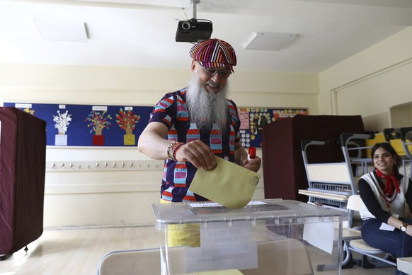 A man votes at a polling station in Ankara, Turkey, Sunday, May 28, 2023. Voters in Turkey are returning to the polls to decide whether the country&#039;s longtime leader stretches his increasingly au ...
