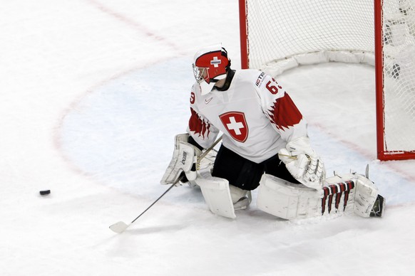 Switzerland&#039;s goaltender Leonardo Genoni saves the puck, during the IIHF 2018 World Championship preliminary round game between Czech Republic and Switzerland, at the Royal Arena, in Copenhagen,  ...