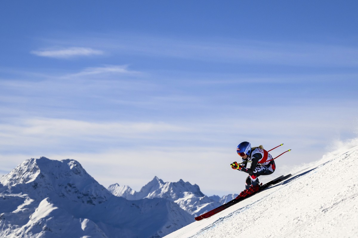 United States? Mikaela Shiffrin speeds down the course during an alpine ski, women's World Cup downhill race, in St. Moritz, Switzerland, Saturday, Dec.9, 2023. (Jean-Christophe Bott/Keystone via ...