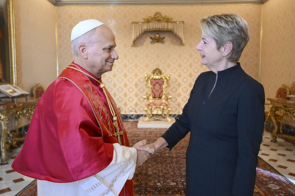 epa12427085 A handout picture provided by Vatican Media shows Pope Leo XIV (L) holding a private audience with Switzerland&#039;s Federal President Karin Keller-Sutter (R) at the Vatican City, 03 Octo ...