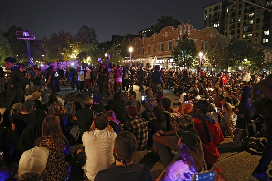 Protesters gather, Friday, Sept. 15, 2017, in St. Louis, after a judge found a white former St. Louis police officer, Jason Stockley, not guilty of first-degree murder in the death of a black man, Ant ...