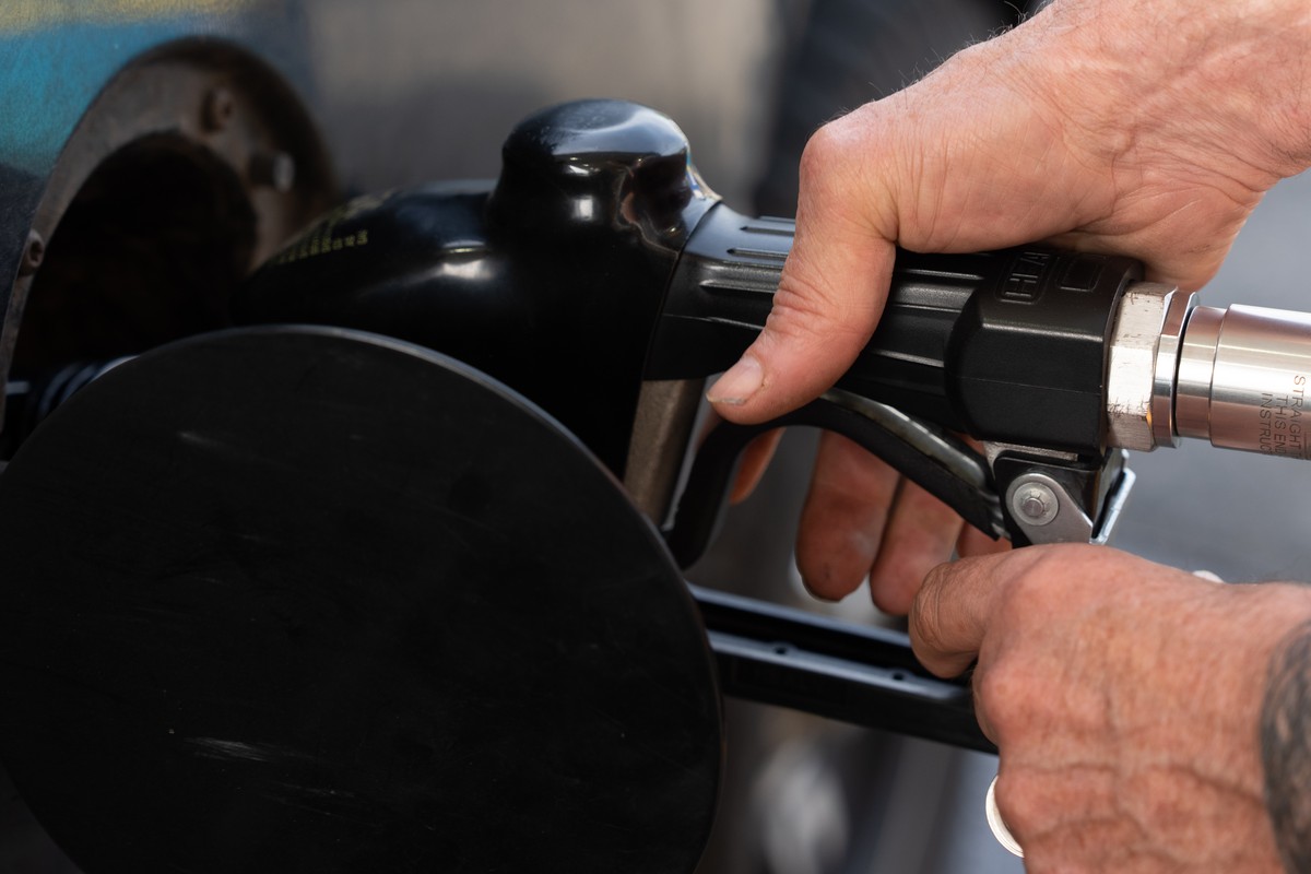 A person secures the fuel nozzel while filling up their tank at a gas station on Tuesday, May 12, 2026, in Portland, Ore. (AP Photo/Jenny Kane)
US Energy Crisis