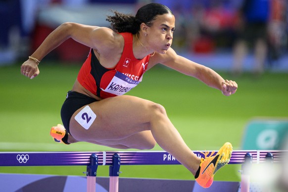 Ditaji Kambundji of Switzerland competes during the women&#039;s 100m Hurdles Round 1 at the 2024 Paris Summer Olympics in Paris, France, Wednesday, August 7, 2024. (KEYSTONE/Laurent Gillieron)