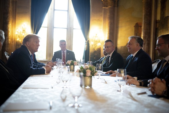 epa11208139 A handout photo made available by the Hungarian Prime Minister&#039;s Office shows ..Former US President and Republican presidential candidate Donald Trump (L) and Hungarian Prime Minister ...