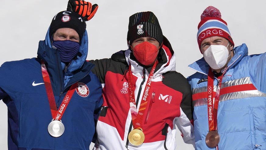 From left, Ryan Cochran-Siegle of the United States, silver, Matthias Mayer of Austria, gold, and Aleksander Aamodt Kilde of Norway, bronze, during the medal ceremony for the men&#039;s super-G at the ...