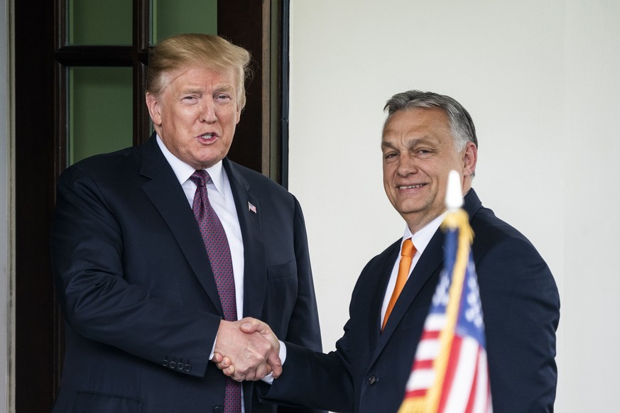 epa07567885 US President Donald J. Trump (L) welcomes Hungarian Prime Minister Viktor Orban (R) to the White House in Washington, DC, USA, 13 May 2019. Their meeting marks the first time a US presiden ...