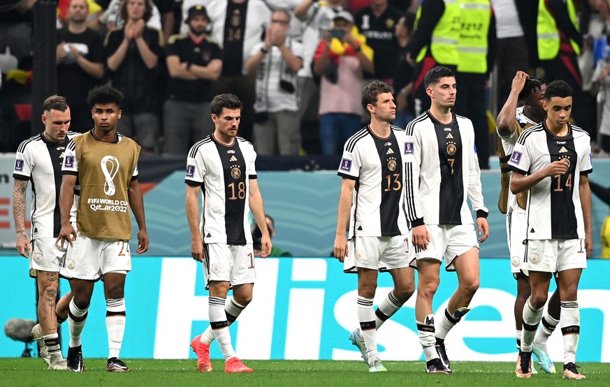 epa10343037 Dejected players of Germany after the FIFA World Cup 2022 group E soccer match between Costa Rica and Germany at Al Bayt Stadium in Al Khor, Qatar, 01 December 2022. EPA/Georgi Licovski