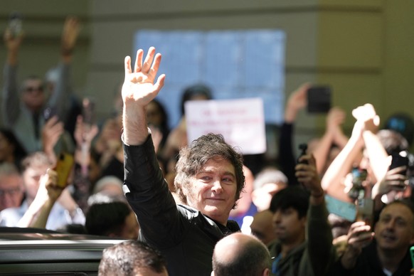 Argentina&#039;s President Javier Milei waves to supporters after voting during legislative midterm elections in Buenos Aires, Argentina, Sunday, Oct. 26, 2025. (AP Photo/Natacha Pisarenko)
Argentina  ...