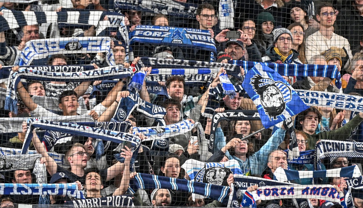 Ambri fans during the game between Switzerland's HC Ambri-Piotta and Finland's IFK Helsinki, at the 94th Spengler Cup ice hockey tournament in Davos, Switzerland, Wednesday, December 28, 202 ...