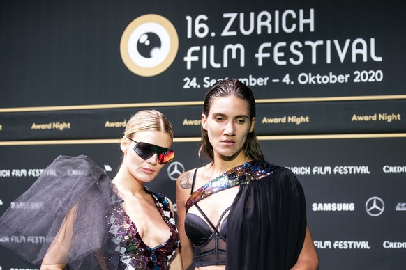 epa08718676 Swiss models Dominique Rinderknecht (L) and Tamy Glauser pose on the Green Carpet during the Award Night ceremony at the 16th Zurich Film Festival (ZFF) in Zurich, Switzerland, 03 October  ...