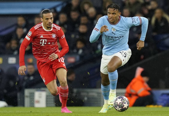 Manchester, England, 11th April 2023. Leroy Sane of Bayern Munich and Manuel Akanji of Manchester City during the UEFA Champions League match at the Etihad Stadium, Manchester. Picture credit should r ...