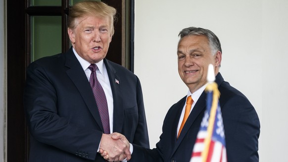 epa07567885 US President Donald J. Trump (L) welcomes Hungarian Prime Minister Viktor Orban (R) to the White House in Washington, DC, USA, 13 May 2019. Their meeting marks the first time a US presiden ...