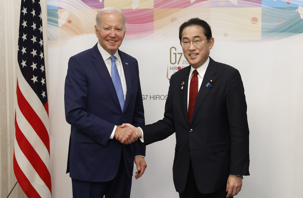 President Joe Biden, left, shakes hands with Japan's Prime Minister Fumio Kishida prior to a bilateral meeting in Hiroshima, Japan, Thursday, May 18, 2023, ahead of the start of the G-7 Summit.(K ...