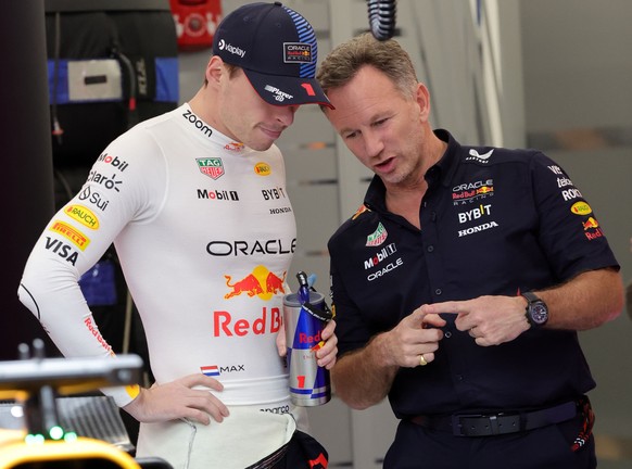 epa11207190 Red Bull Racing team principal Christian Horner (R) and driver Max Verstappen of Netherlands talk in the pits during the Qualifying for the Formula One Saudi Arabia Grand Prix, at the Jedd ...