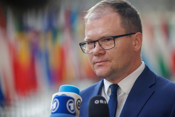 epa12502528 Minister of the Environment, Nature Conservation and Nuclear Safety of Germany Carsten Schneider speaks with the media during the European Environment Council meeting in Brussels, Belgium, ...