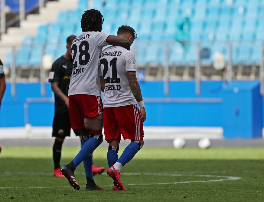 epa08514434 Hamburg&#039;s Tim Leibold (R) and Gideon Jung (L) react after losing the German Bundesliga Second Division soccer match between Hamburger SV and SV Sandhausen in Hamburg, Germany, 28 June ...