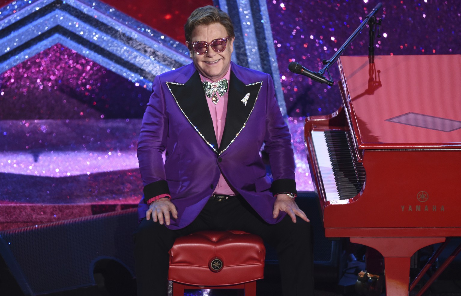 FILE - Elton John is seen after performing &quot;(I&#039;m Gonna) Love Me Again&quot; nominated for the award for best original song from &quot;Rocketman&quot; at the Oscars on Feb. 9, 2020, at the Do ...